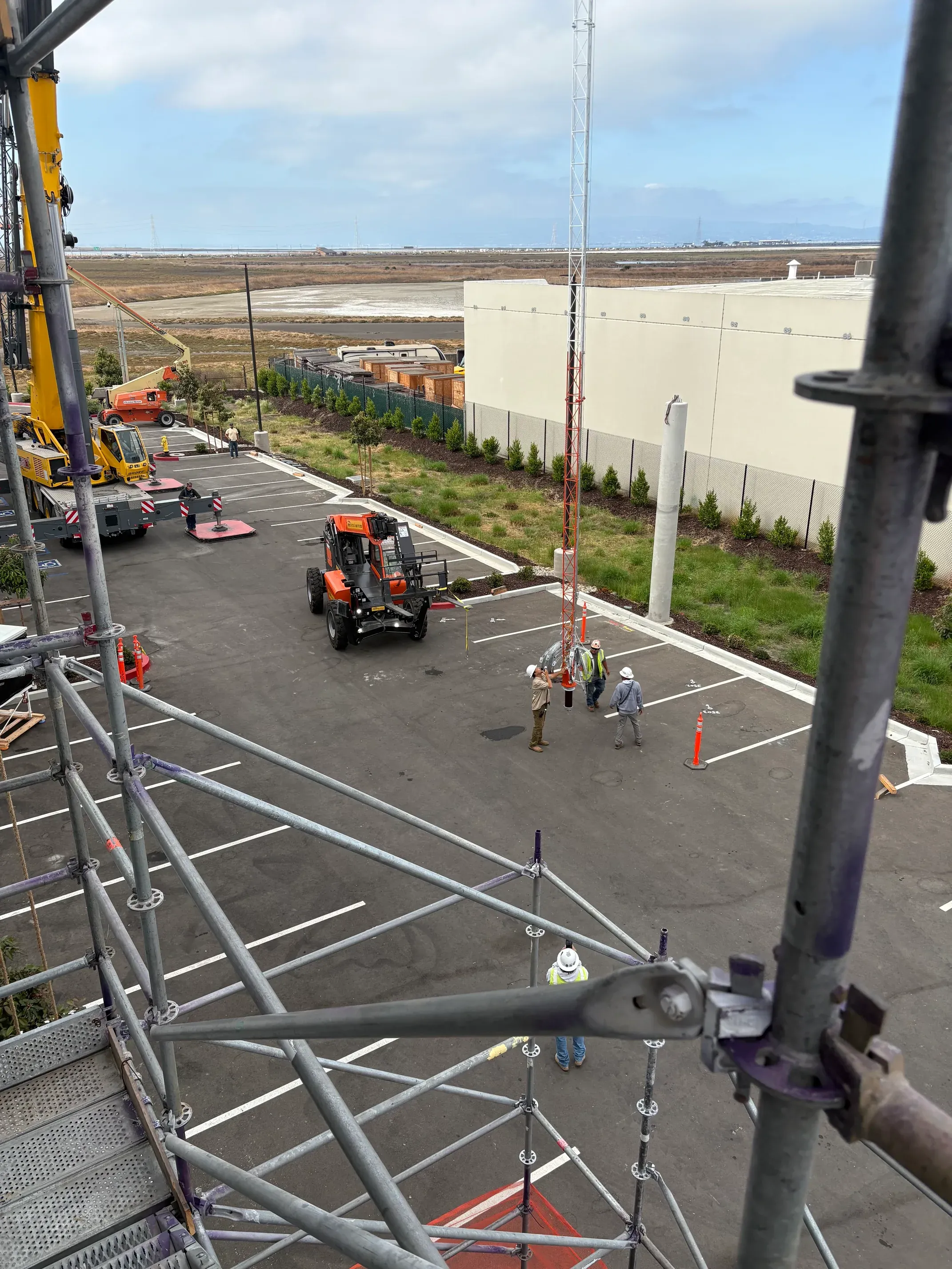 Tower fully assembled on the ground including lights and top-loading skirt