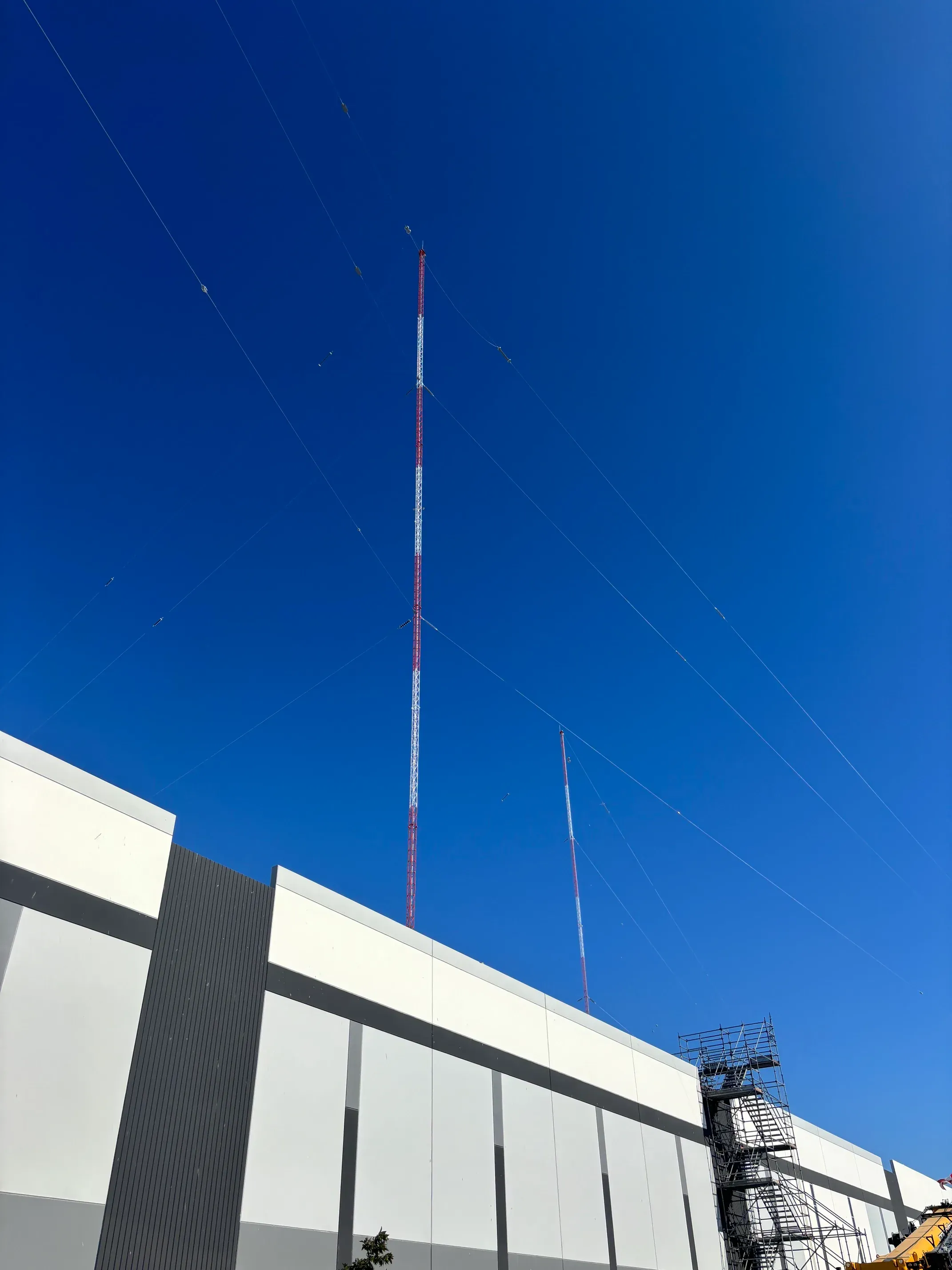 Guy wire tensioning and anchor inspection